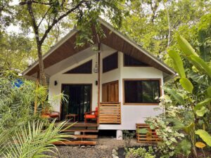 One of the three available 2-bedroom Casitas at the Dragonfly Beach Retreat. Outdoor living area among the gardens.